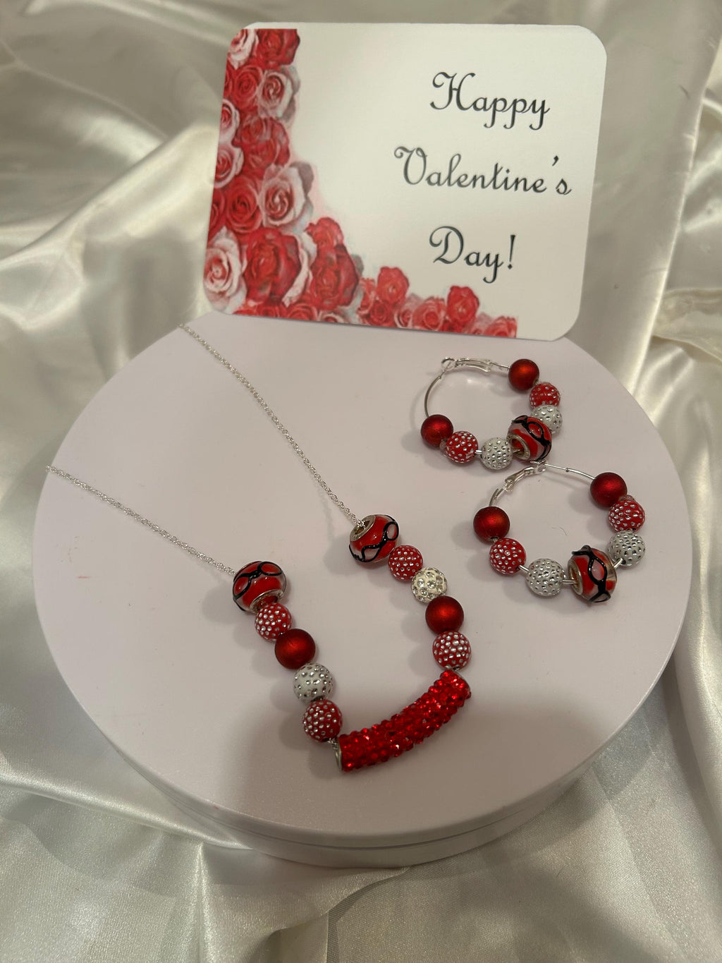 Minimalist red and silver beaded cable chain necklace with matching earrings