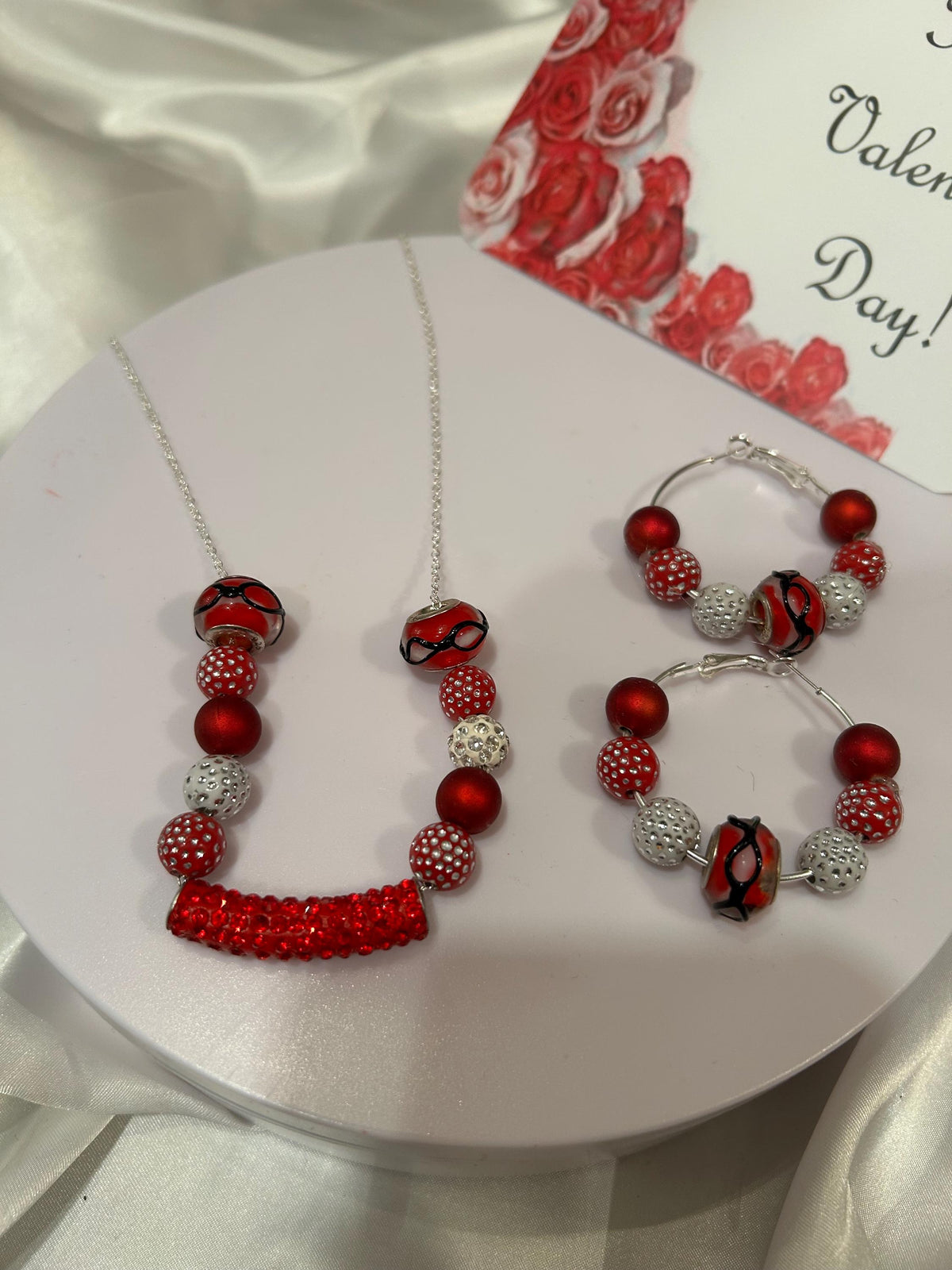 Minimalist red and silver beaded cable chain necklace with matching earrings