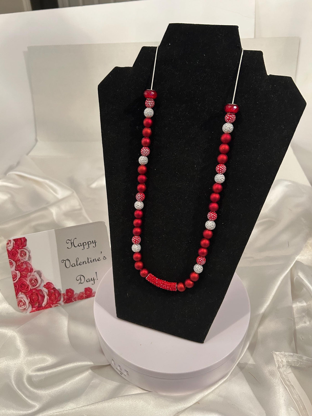 Red and silver sparkling, beaded snake chain 26” necklace.