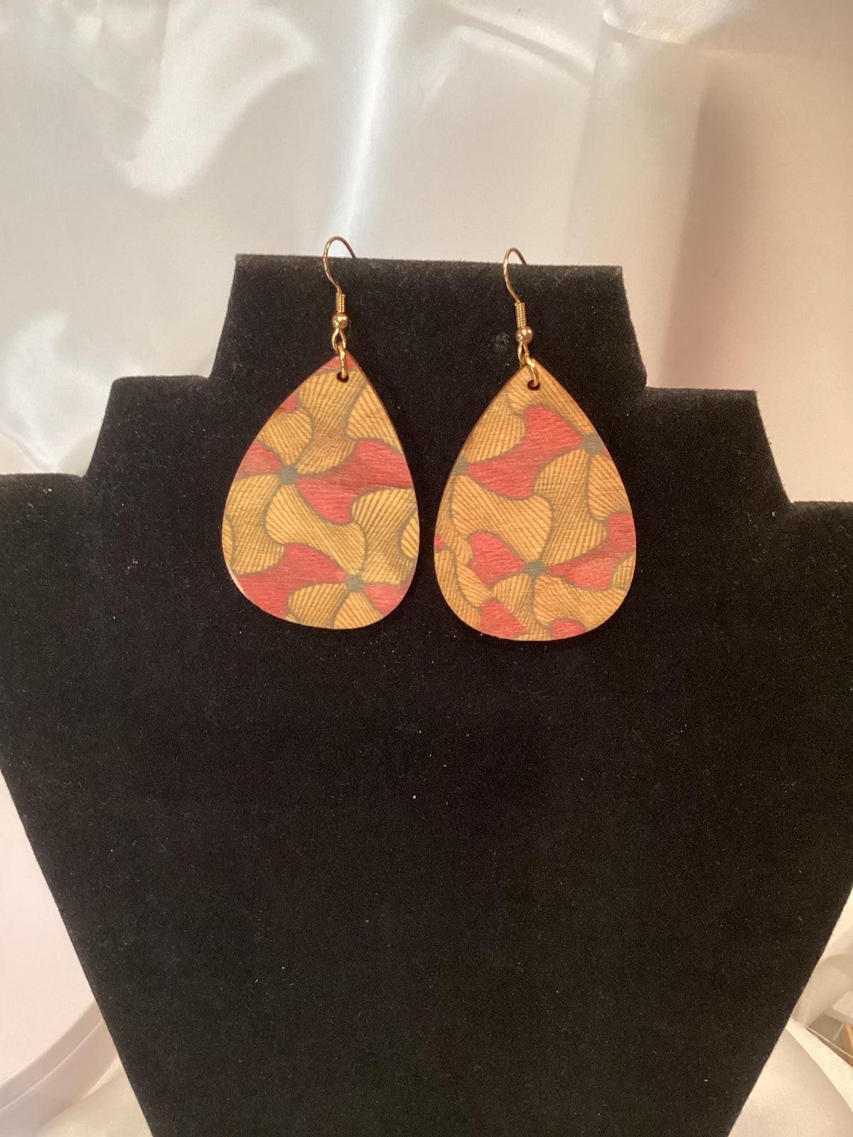 Elegant Africana gold and red colored teardrop earrings