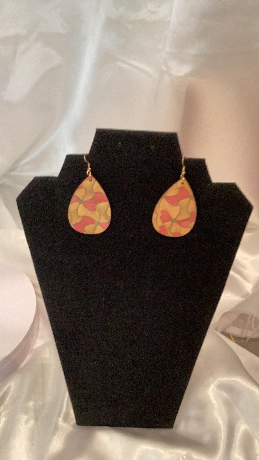 Elegant Africana gold and red colored teardrop earrings