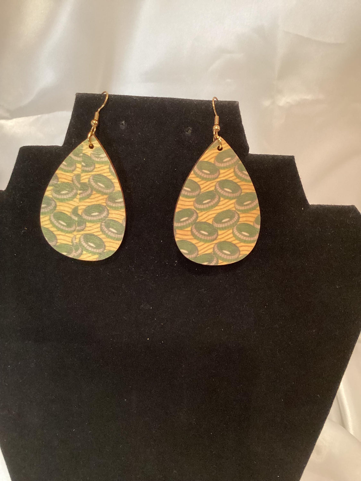 Elegant Africana blue, green and yellow colored teardrop earrings