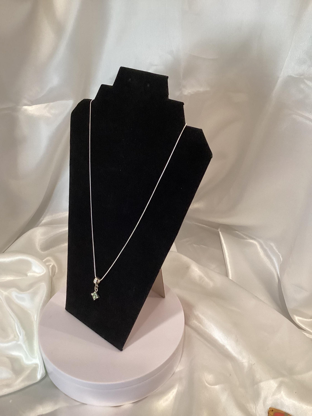Silver-Toned Snake Necklace with Green Pendant