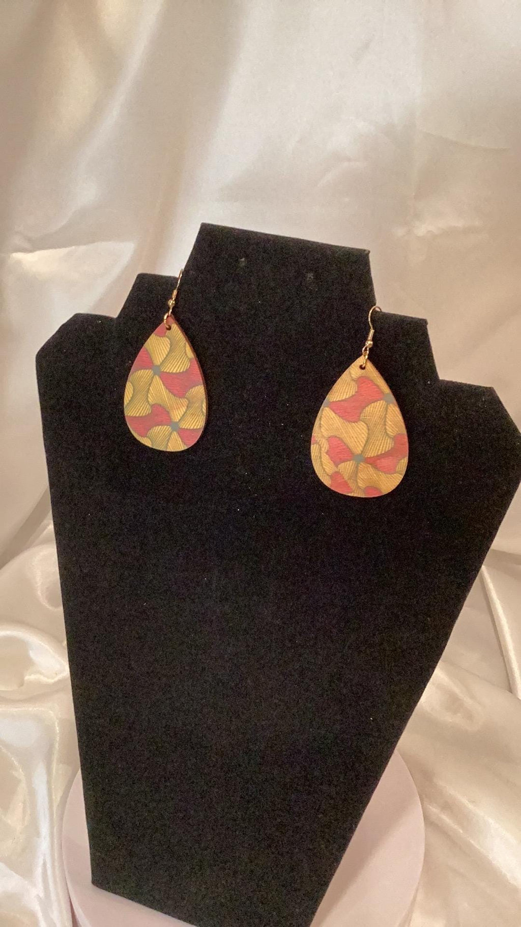 Elegant Africana gold and red colored teardrop earrings
